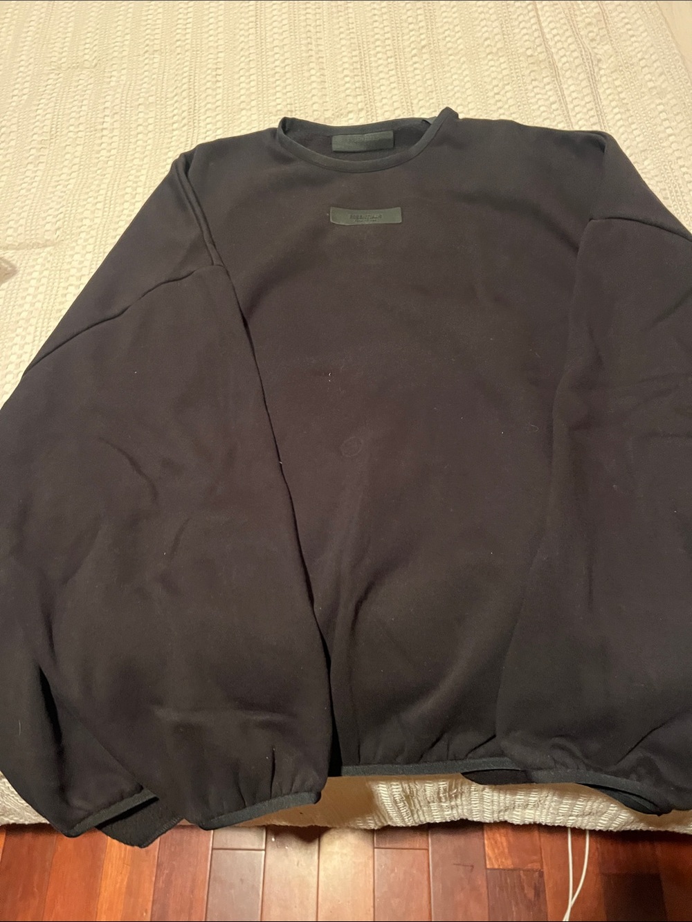 Essentials Black Crewneck Pullover with Subtle Logo